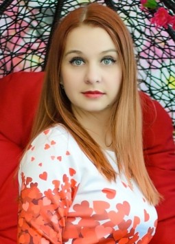 Olha from Nikolaev, 32 years, with blue eyes, red hair, Christian, Accounting.