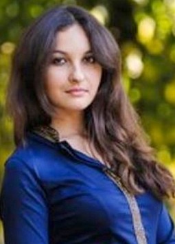 Anna from Rovno, 31 years, with brown eyes, dark brown hair, Catholic, top-manager.