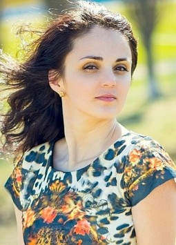 Olga from Rovno, 36 years, with brown eyes, black hair, Christian, teacher.