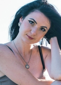 Ekaterina from Poltava, 33 years, with brown eyes, black hair.