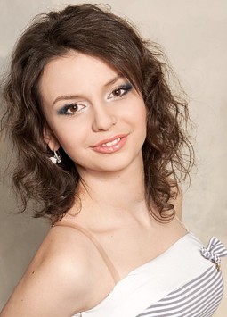 Anastasia from Kharkov, 28 years, with brown eyes, dark brown hair, Christian, travel agent.