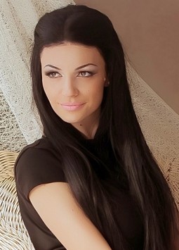 Irina from Donetsk, 37 years, with hazel eyes, black hair, Christian, designer of clothes.